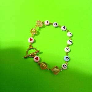 Charming Pink and Gold Beaded Charm Bracelet